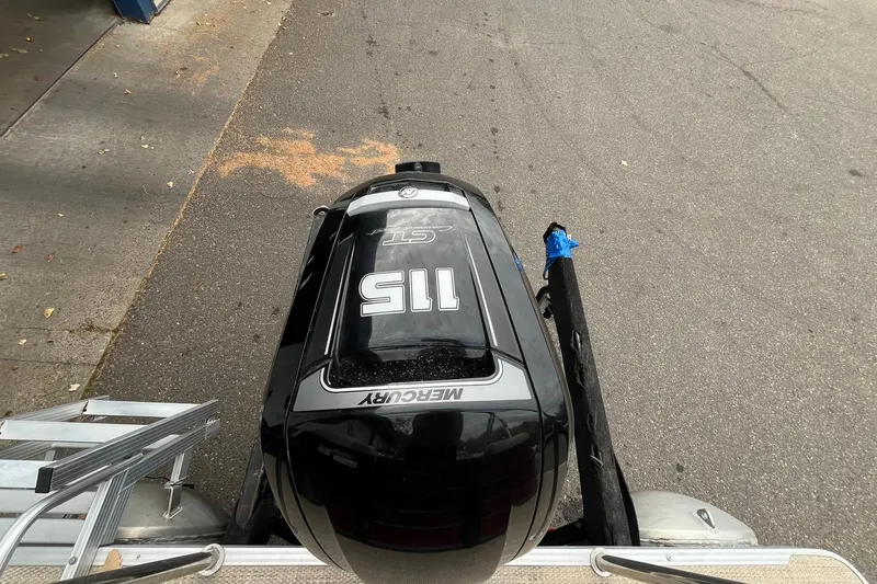 Slide: The Image of 2017 Crest I 220 L boat with Mercury 115 outboard motor on pavement. - 15