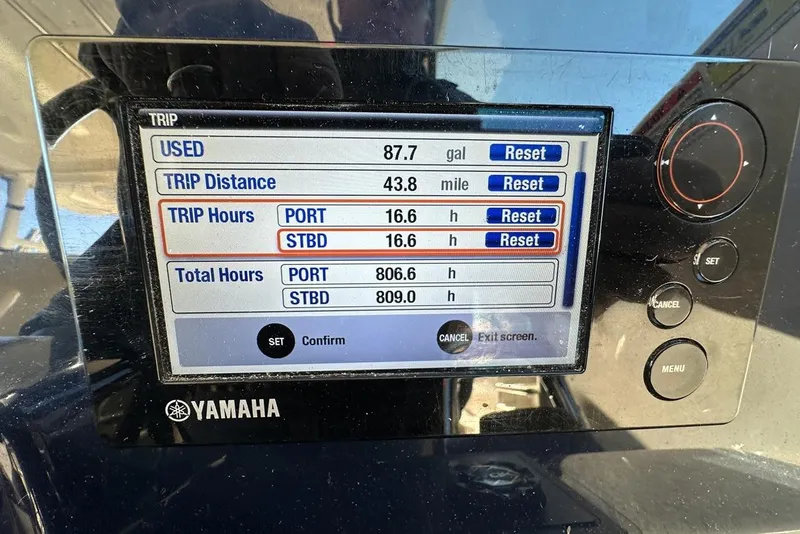 Slide: The Image of Yamaha display on 2016 Pursuit DC 325 Dual Console showing trip and total hours. - 23