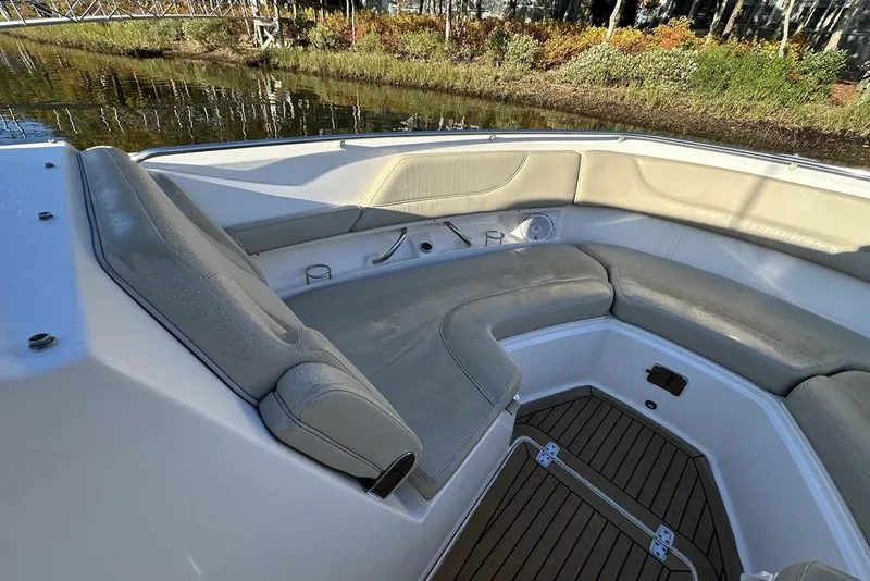 Slide: The Image of 2016 Pursuit DC 325 Dual Console boat with spacious seating area. - 30