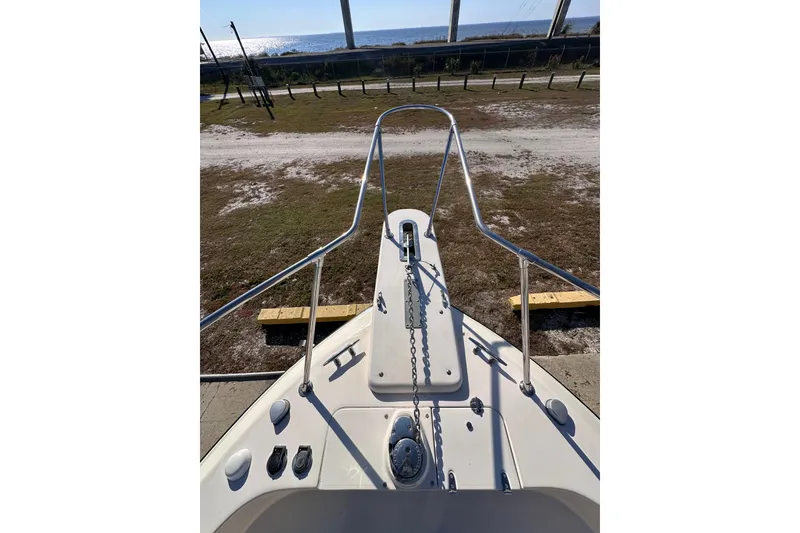Slide: The Image of 2007 Grady-White Marlin 300 boat deck with railing and anchor chain. - 12