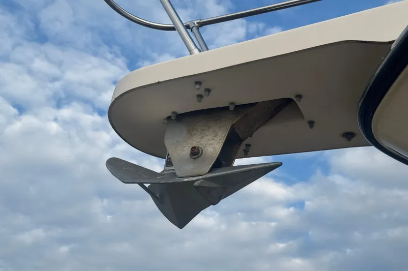 Slide: The Image of Close-up of 2007 Grady-White Marlin 300 boat anchor against cloudy sky. - 15