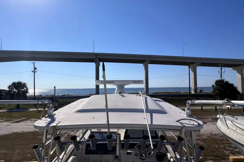 Slide: The Image of 2007 Grady-White Marlin 300 boat with ocean view under a clear blue sky. - 20