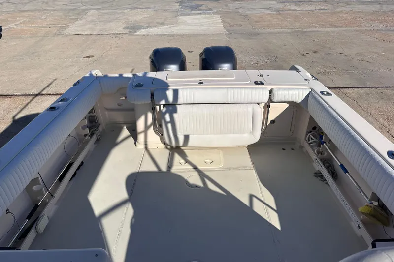 Slide: The Image of 2007 Grady-White Marlin 300 boat interior with dual outboard motors. - 22