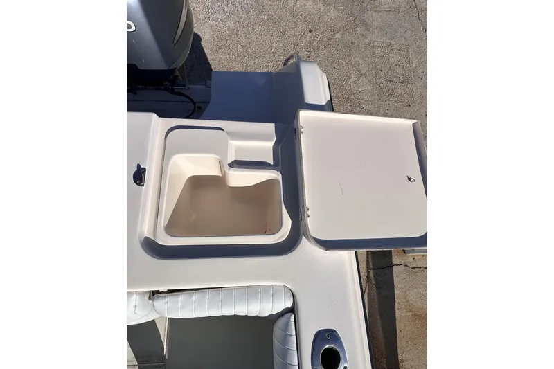Slide: The Image of 2007 Grady-White Marlin 300 boat deck with open storage compartment. - 27