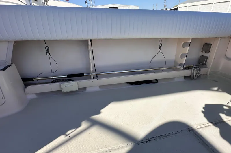 Slide: The Image of 2007 Grady-White Marlin 300 boat interior with seating and storage area. - 32