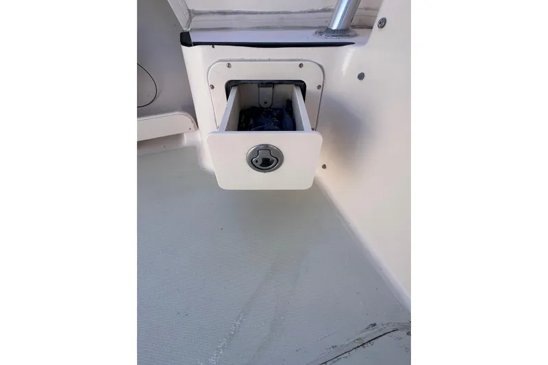 Slide: The Image of Storage compartment on a 2007 Grady-White Marlin 300 boat interior. - 33