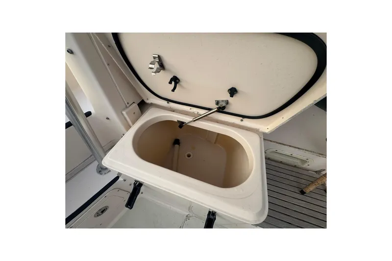 Slide: The Image of Open storage compartment on 2007 Grady-White Marlin 300 boat deck. - 38