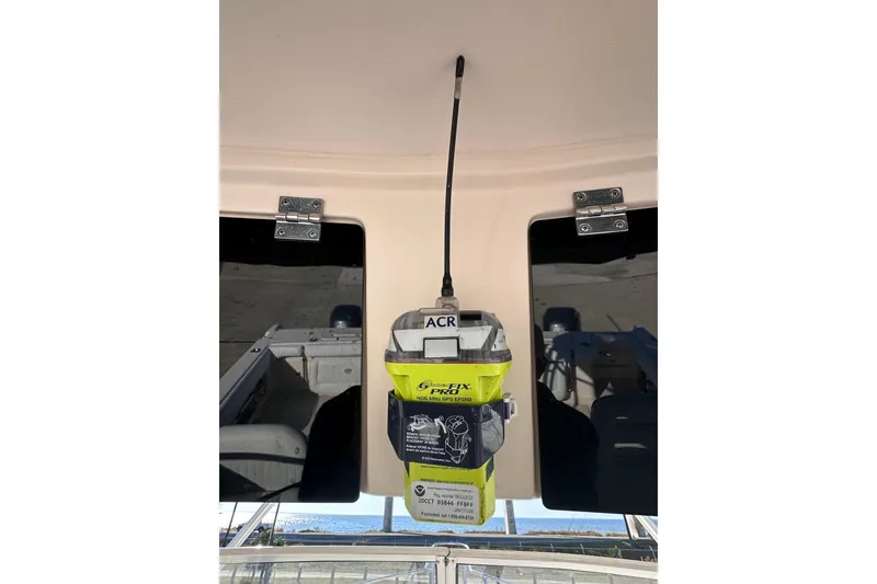 Slide: The Image of ACR GPS device mounted on 2007 Grady-White Marlin 300 boat ceiling. - 41