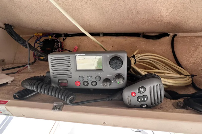 Slide: The Image of Raymarine radio equipment inside a 2007 Grady-White Marlin 300 boat. - 42