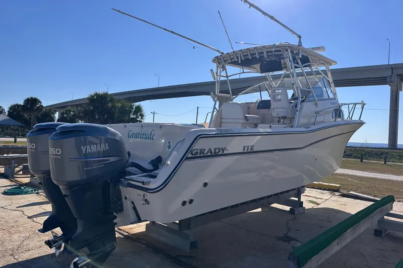 Slide: The Image of 2007 Grady-White Marlin 300 boat with twin Yamaha 250 engines on display. - 7