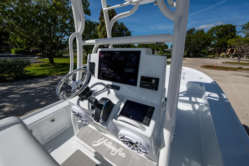 Slide: The Image of 2026 Yellowfin 24 Bay CE boat console with advanced navigation and controls. - 3