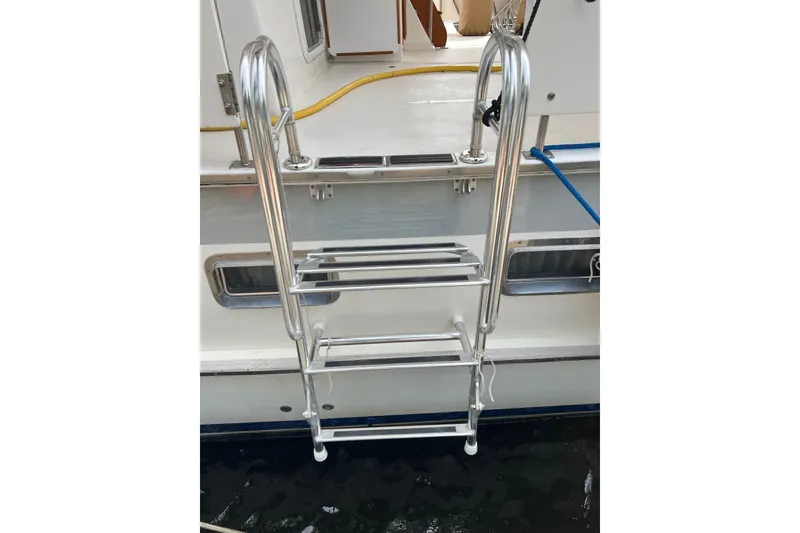 Slide: The Image of Stainless steel ladder on 1998 DeFever 44 Sundeck Trawler yacht. - 36