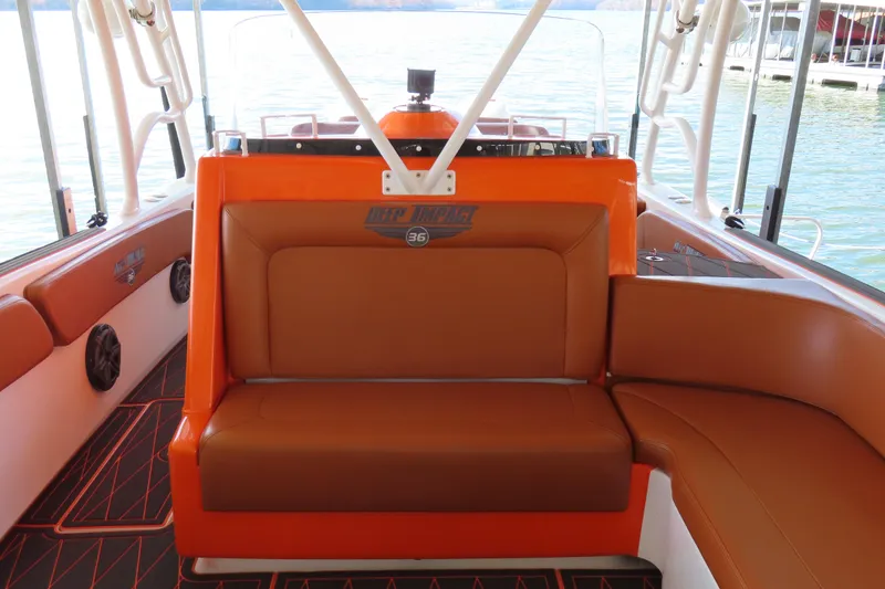 Slide: The Image of Interior of 2007 Deep Impact 36 boat with orange and brown seating. - 10