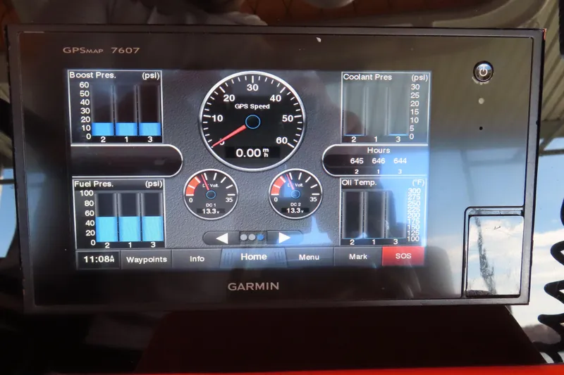 Slide: The Image of Garmin GPSMAP 7607 display showing boat engine metrics for Deep Impact 36, 2007 model. - 16