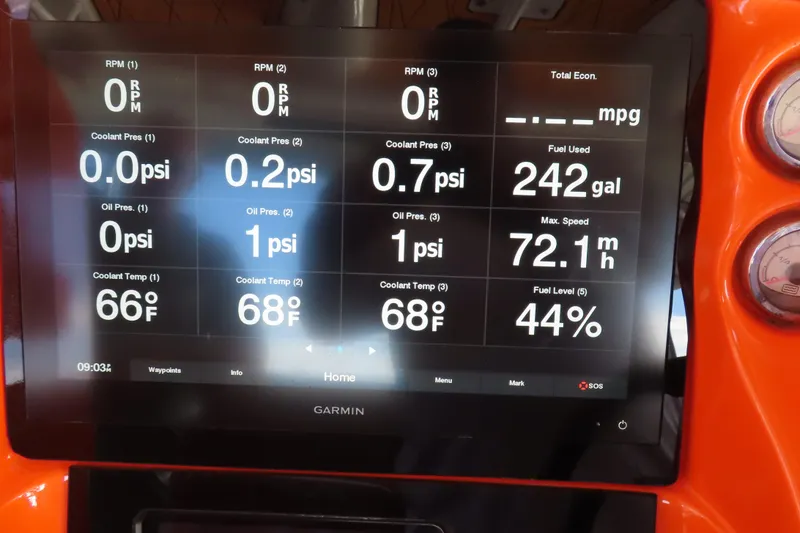 Slide: The Image of Garmin display showing engine metrics on a 2007 Deep Impact 36 boat. - 17