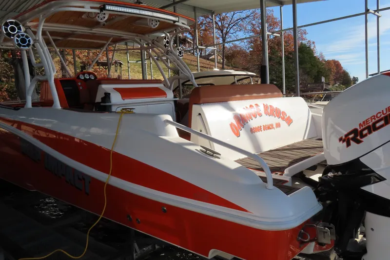 Slide: The Image of 2007 Deep Impact 36 boat with Mercury Racing engine, docked at Osage Beach, MO. - 2