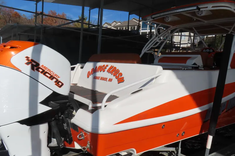 Slide: The Image of 2007 Deep Impact 36 boat with Mercury Racing engine, featuring "Orange Krush" design. - 3