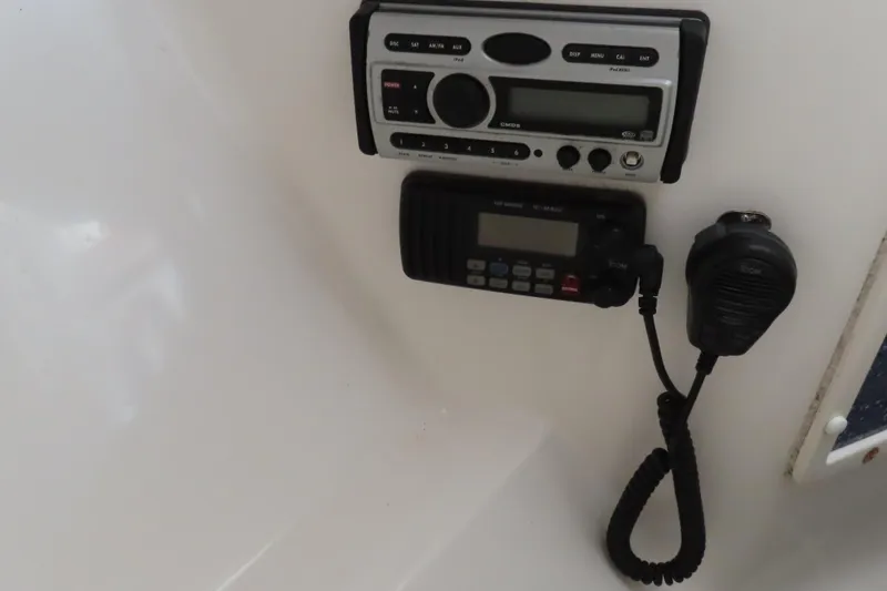 Slide: The Image of Boat radio and communication equipment on a 2007 Deep Impact 36. - 30