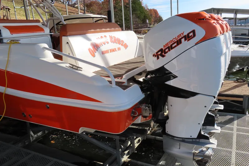 Slide: The Image of 2007 Deep Impact 36 boat with Mercury Racing engine, docked at marina. - 4