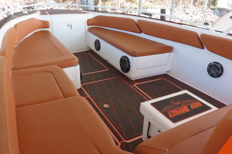 Slide: The Image of Luxurious 2007 Deep Impact 36 boat interior with brown leather seating and stylish flooring. - 7