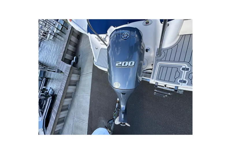 Slide: The Image of 2016 Robalo R227 Dual Console with Yamaha 200 outboard motor, docked at marina. - 5