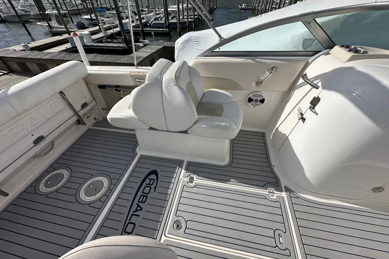 Slide: The Image of 2016 Robalo R227 Dual Console boat interior with seating and deck details. - 9
