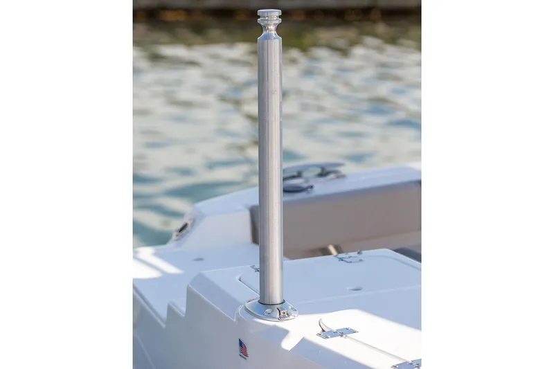 Slide: The Image of Manufacturer Provided Image: 2025 Solara S-250 CW boat with a stainless steel pole on deck, near water. - 23