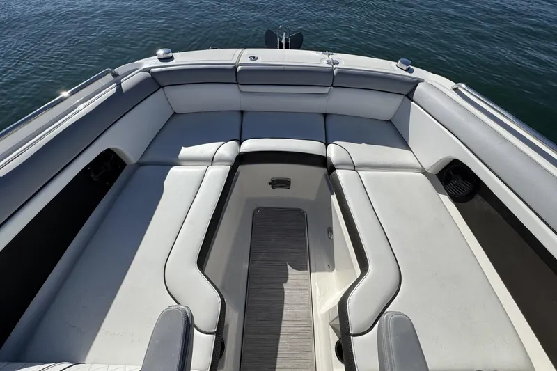 Slide: The Image of 2017 Sea Ray SDX 270 Outboard boat interior with spacious seating and elegant design. - 14