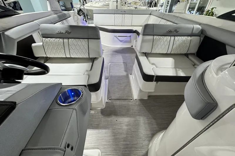 Slide: The Image of 2017 Sea Ray SDX 270 Outboard interior with luxurious seating and modern design. - 18