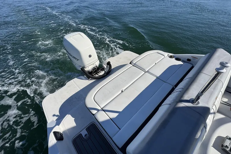 Slide: The Image of 2017 Sea Ray SDX 270 Outboard boat with Mercury engine on open water. - 23