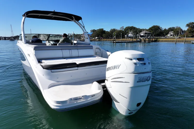 Slide: The Image of 2017 Sea Ray SDX 270 Outboard boat with Mercury 350 engine on calm water. - 3