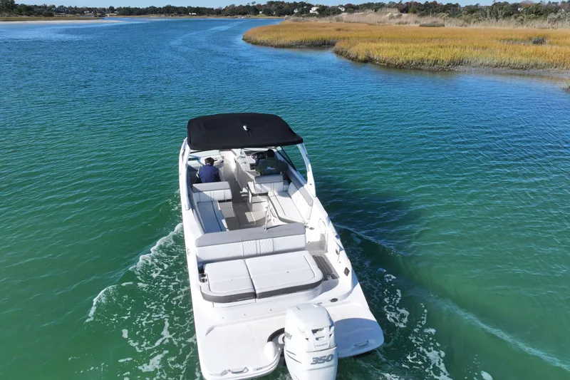 Slide: The Image of 2017 Sea Ray SDX 270 Outboard cruising on a scenic waterway. - 7