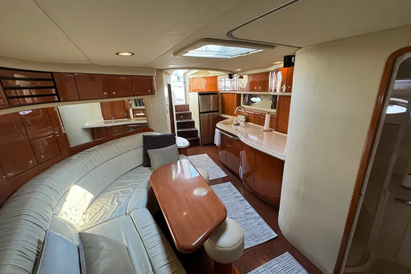 Slide: The Image of Luxurious interior of 2001 Sea Ray 540 Sundancer yacht with elegant wood finishes. - 24