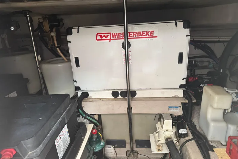 Slide: The Image of Engine room of 2001 Sea Ray 540 Sundancer with Westerbeke generator. - 36