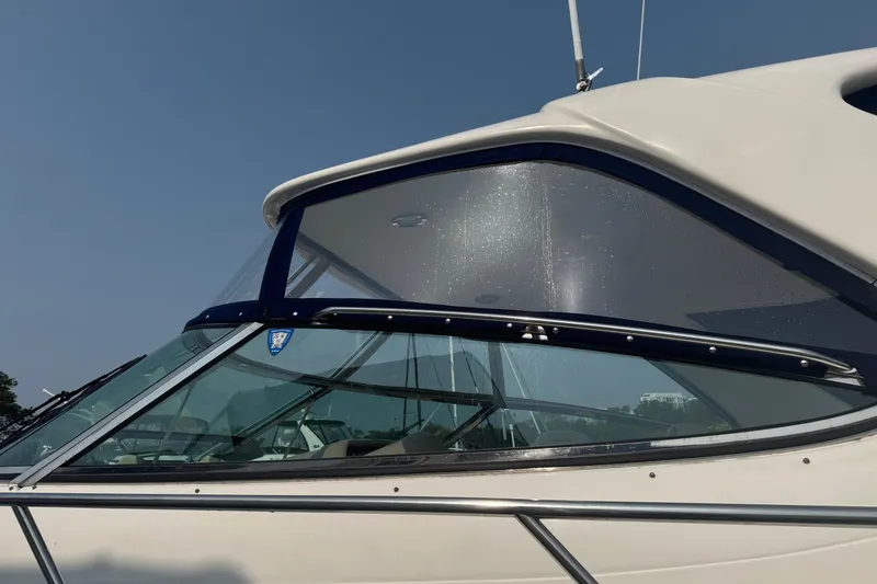 Slide: The Image of Close-up of 2001 Sea Ray 540 Sundancer yacht's sleek windshield design. - 8