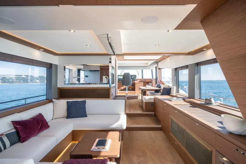 Slide: The Image of Luxurious interior of 2025 Beneteau Grand Trawler 63 yacht with ocean view. - 30