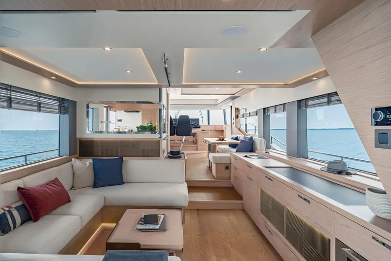 Slide: The Image of Luxurious interior of 2025 Beneteau Grand Trawler 63 yacht with modern design and ocean view. - 7