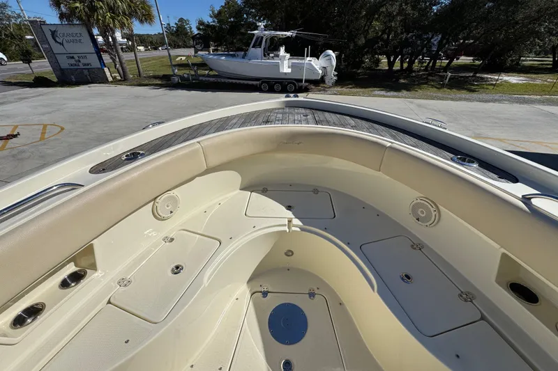 Slide: The Image of 2019 Chris-Craft Catalina 30 boat interior with seating and storage compartments. - 18