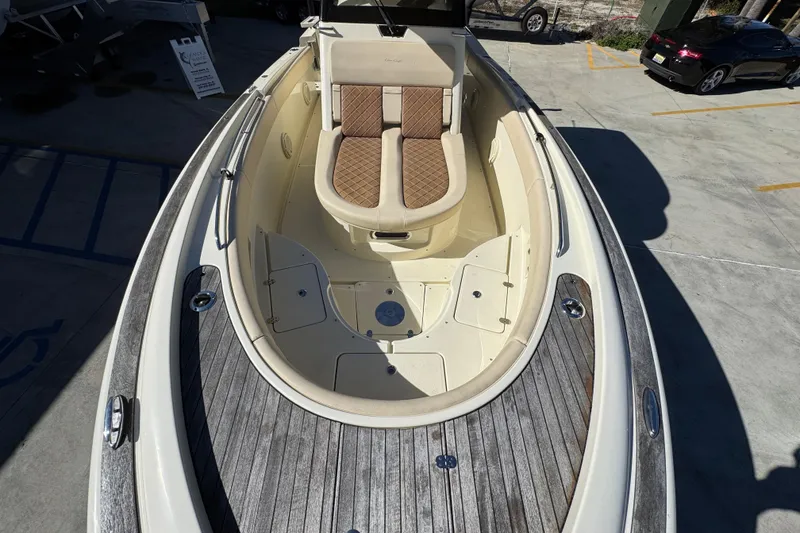 Slide: The Image of 2019 Chris-Craft Catalina 30 boat with elegant seating and teak deck. - 20