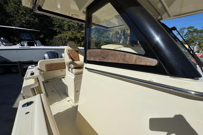 Slide: The Image of 2019 Chris-Craft Catalina 30 boat interior with seating and helm details. - 23