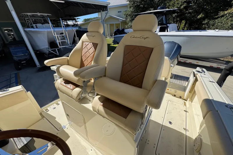 Slide: The Image of Luxurious seating on a 2019 Chris-Craft Catalina 30 boat, showcasing elegant design and comfort. - 25
