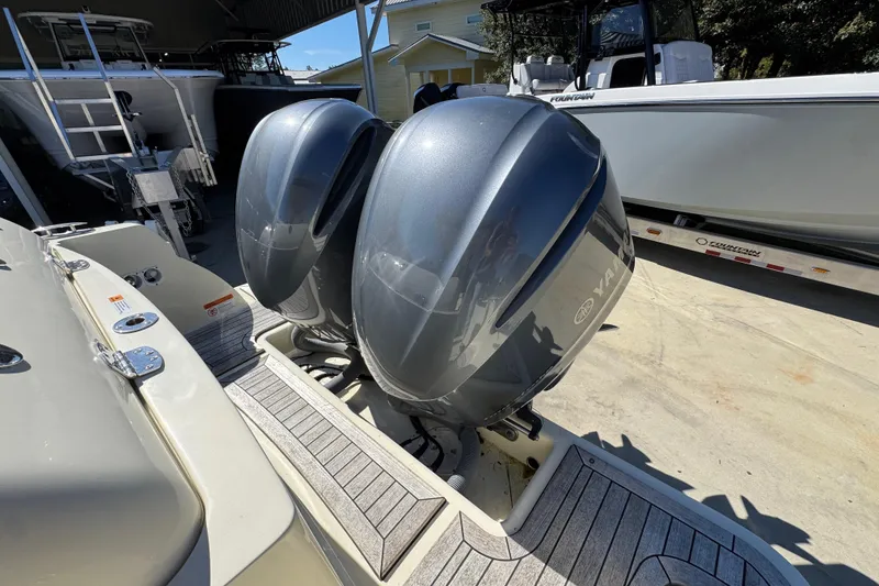 Slide: The Image of 2019 Chris-Craft Catalina 30 with dual Yamaha outboard engines, docked outdoors. - 35