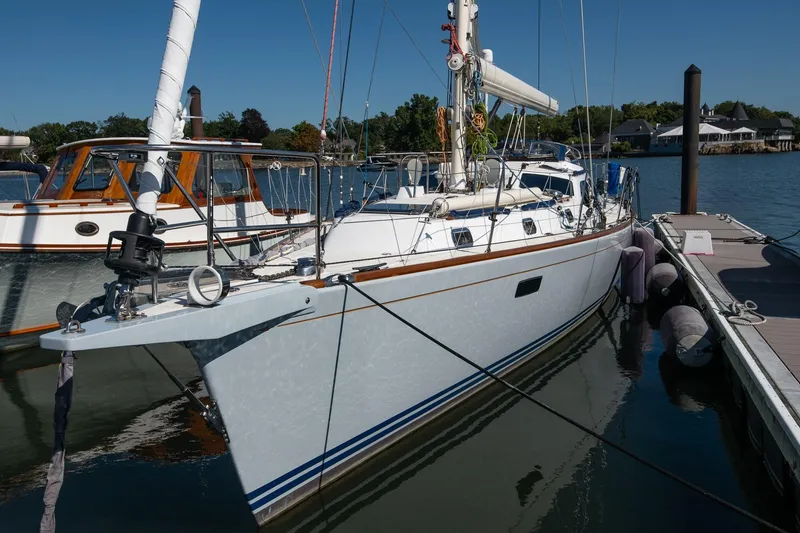 Slide: The Image of 2007 Morris Ocean Series 45 sailboat docked in a marina under clear blue skies. - 10