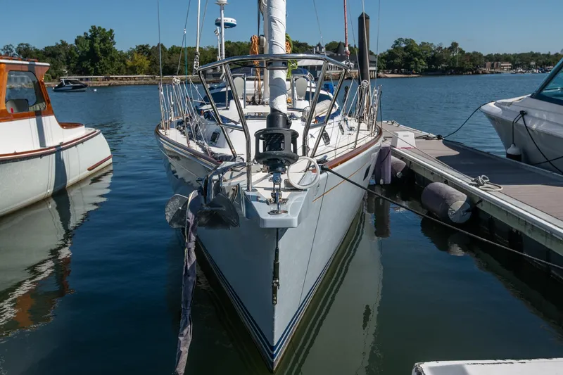 Slide: The Image of Morris Ocean Series 45 sailboat docked at marina, 2007 model, calm water, clear sky. - 11
