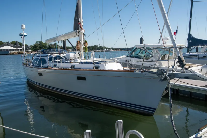 Slide: The Image of Sailboat Morris Ocean Series 45, 2007 model, docked in a marina on a sunny day. - 12