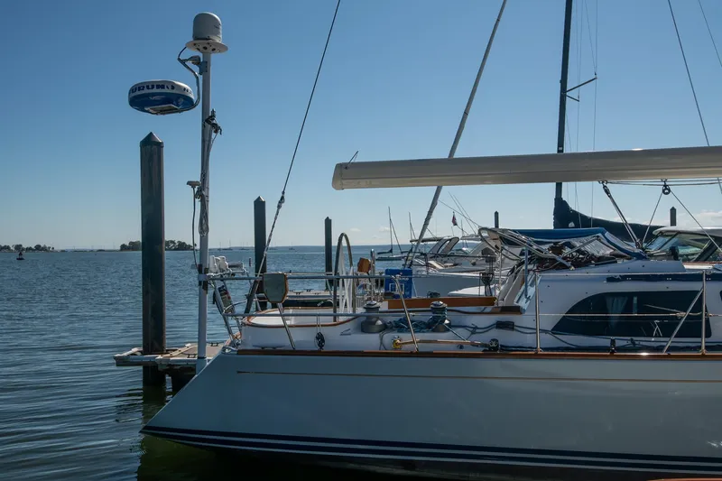 Slide: The Image of 2007 Morris Ocean Series 45 yacht docked at a marina on a sunny day. - 13