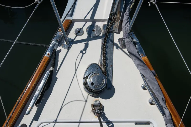 Slide: The Image of Deck of 2007 Morris Ocean Series 45 sailboat with anchor chain and winch. - 22