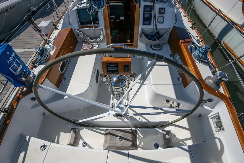 Slide: The Image of Cockpit of 2007 Morris Ocean Series 45 sailboat with steering wheel and navigation instruments. - 25