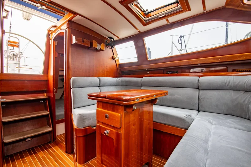 Slide: The Image of Luxurious 2007 Morris Ocean Series 45 yacht interior with wooden finish and plush seating. - 27