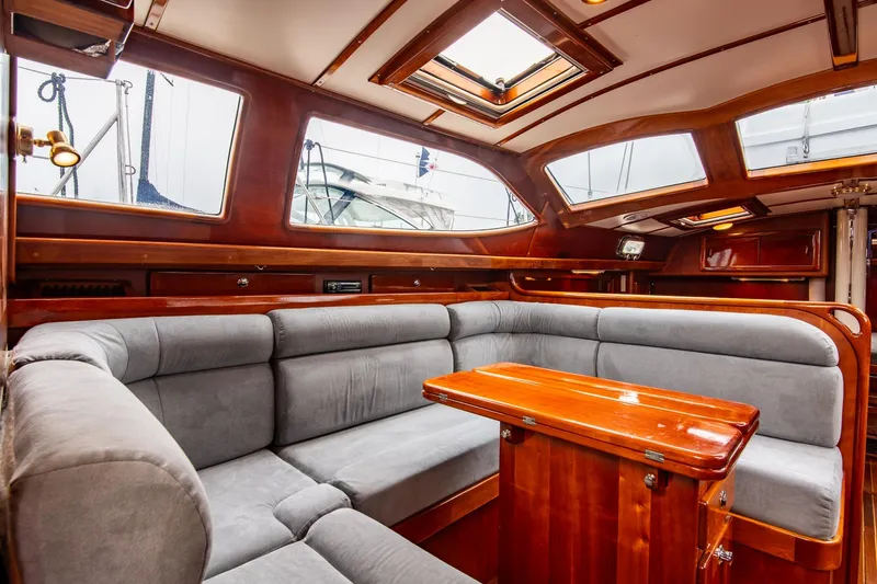 Slide: The Image of Luxurious interior of 2007 Morris Ocean Series 45 yacht with plush seating and wooden finishes. - 31